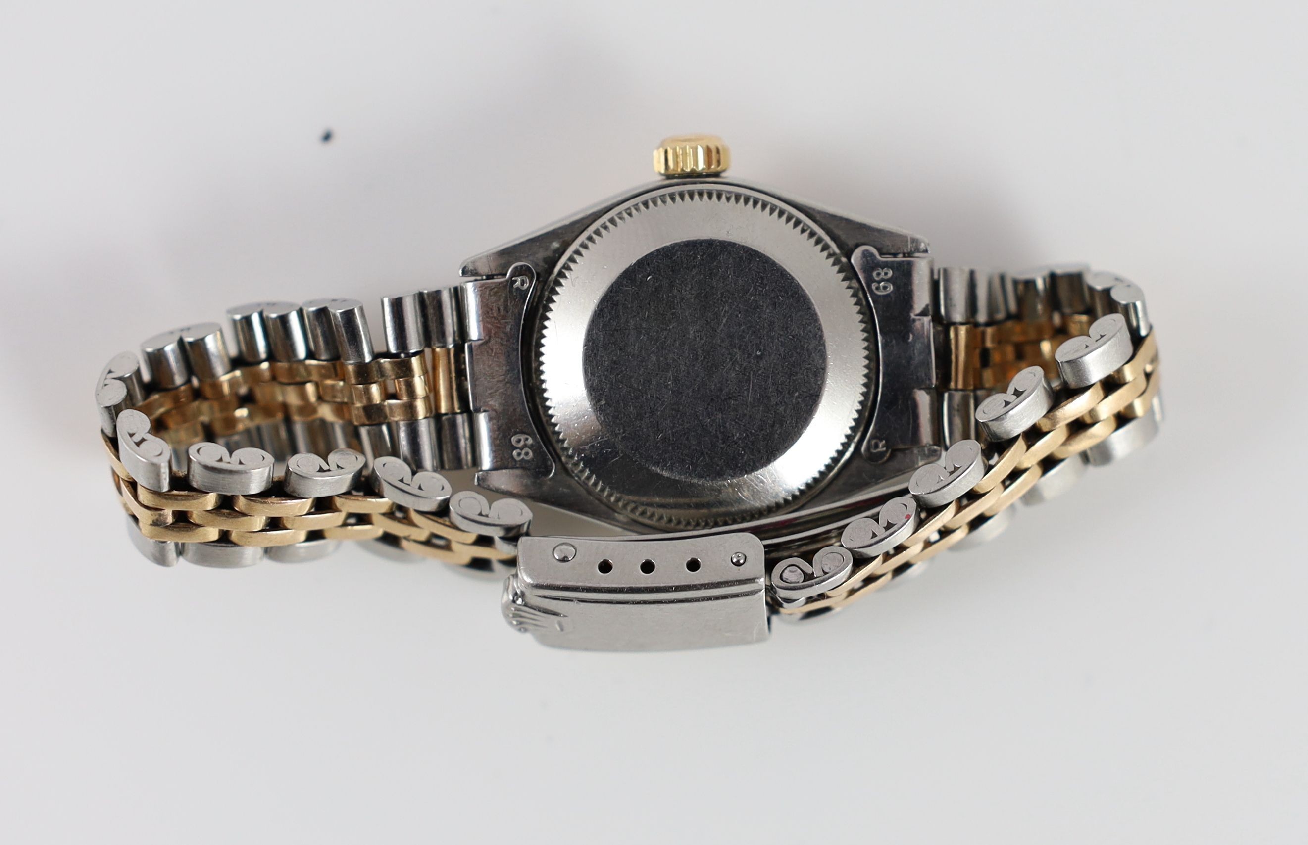 A lady's 1970's steel and gold Rolex Oyster Perpetual Date wrist watch, on a Rolex steel and gold bracelet